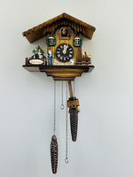 Quartz Cuckoo Clock – Heidi's Chalet – 8-inch Height with Revolving Figures – By River City Clocks