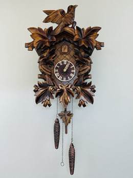 Cuckoo Clock With Hand-Carved Maple Leaves – 16 Inch Quartz Movement by River City Clocks