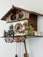 12 Melody Chalet Cuckoo Clock 10 Inch With Animated Rocking Horse Girl, Silent Mode, And Volume Control By River City Clocks