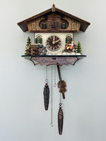 Chalet Desktop Cuckoo Clock 10 Inch With Girl On Rocking Horse, Waterwheel, 12 Melodies, Hourly Cuckoo By River City Clocks