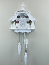 13-Inch White Cuckoo Clock with Carved Cottage, Pine Trees & Silver Details by River City Clocks