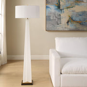 Modern white lamp with black and brass base