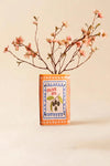 Ceramic olive oil vase with vintage inspired label artwork and glossy glazed finish