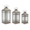 Brown Metal and Glass Lanterns Trio 14, 17, 20 Inch Height Indoor Outdoor Decor By Melrose