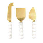 white beaded cheese knives,