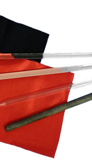 Set of percussion instruments including mallets, beater, and other tools on a white background