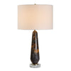 Table lamp with a decorative brown base on a white background
