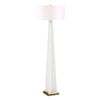 Tall floor lamp with a white shade on a white background