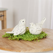 small bird sculptures