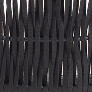 Close-up of black woven material with a blurred background