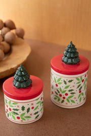 Two small round ceramic containers with lids