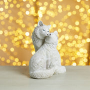 white holiday figurine