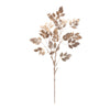 Decorative leaf branch with gold and bronze leaves on a white background