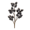 Artificial flower branch with gray berries on a white background
