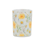 Candle with floral design on a white background
