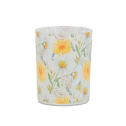 Candle with floral design on a white background