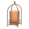 Decorative candle holder with a gold metallic frame and amber glass on a white background