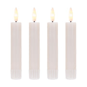 Wireless remote-controlled LED taper candles in ivory finish
