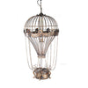Decorative hot air balloon lamp with chains on a white background