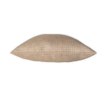 Beige woven pillow on a white background