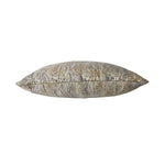 Decorative pillow with a leaf pattern on a white background