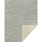 Textured gray rug with a corner showing a lighter color