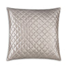 Quilted pillow with diamond pattern on a white background