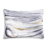 Decorative pillow with marble pattern and gold accents on a white background