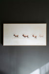 Framed acrylic painting of elk in snowy landscape