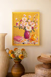 Yellow framed still life painting with flowers and fruit