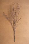 Artificial branch on a brown background