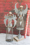 Set of two metal Christmas angels on mantel