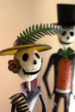 Painted metal skeletons