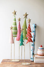 Set of two painted metal Christmas tree trio figurines