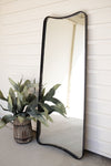 Organic leaning full-length mirror