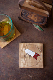 Rustic fishing lure-shaped coaster holder