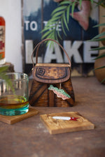 Square wooden coasters in lure style holder