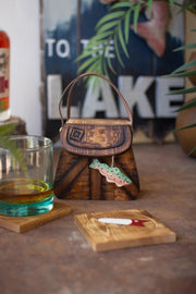 Square wooden coasters in lure style holder