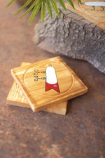 Wooden drink coasters stored in lure holder