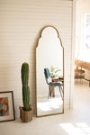 Large brass arched mirror by Kalalou