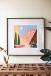Geometric desert scene wall art – framed in beaded detail
