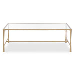 Glass coffee table with a gold frame on a white background