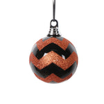 Vickerman MT2210510 4" Black Orange Round Ornament 4 Per Bag.