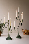 Tall metal candle holders with rustic finish
