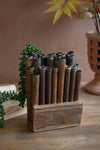 Reclaimed wood spool art for shelf styling
