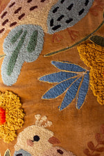 Set of two embroidered bird pillows in assorted colors