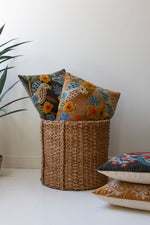 Nature-inspired embroidered pillows pair