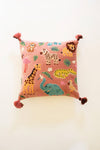 Decorative pillow with animal patterns on a white background