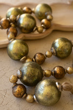 Glass Christmas Ball Garland with Jute Tassels – Mixed Gold Holiday Accent Kalalou