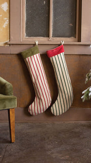 Kalalou velvet-collared Christmas stockings hanging on mantel